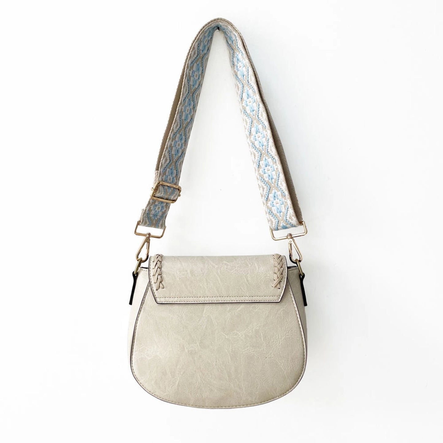 the Eva Saddle Crossbody Bag with Jacquard Strap - Ivory